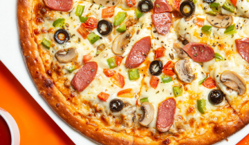 Pizza with toppings and sauce